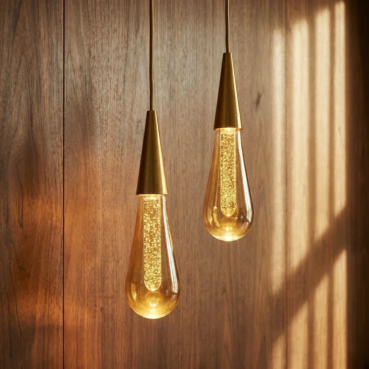 Gold-tone double teardrop pendant lights