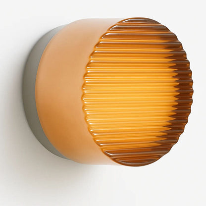 Round LED wall sconce with glass diffuser