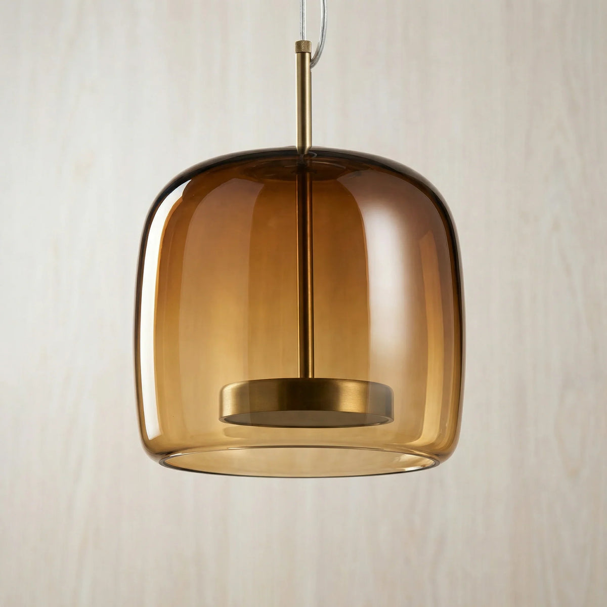 Dark amber glass dome pendant with cylindrical metal light