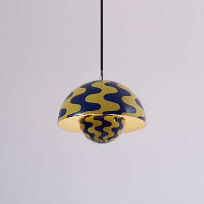 Blue and yellow patterned dome pendant with light on