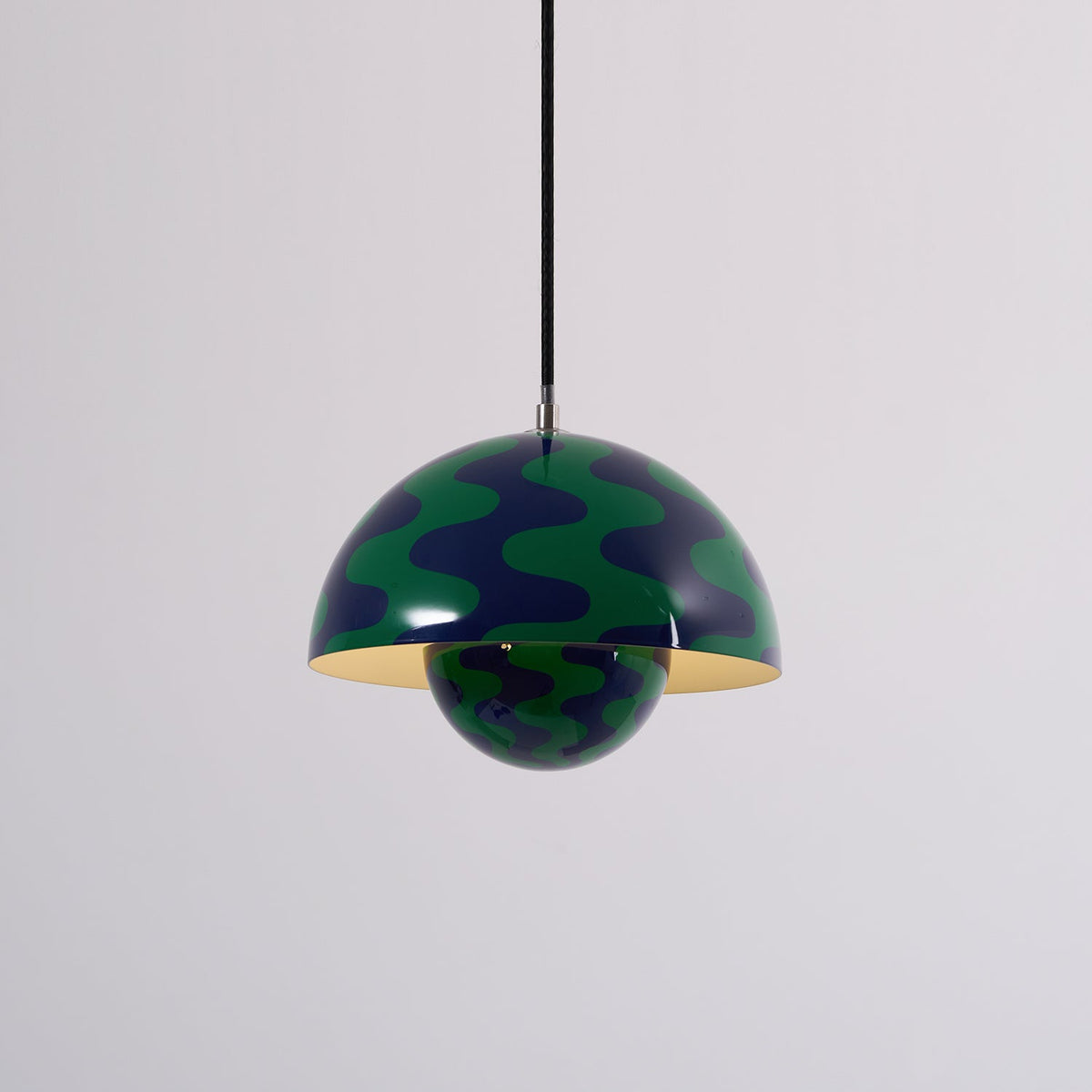 Illuminated blue and green patterned dome pendant