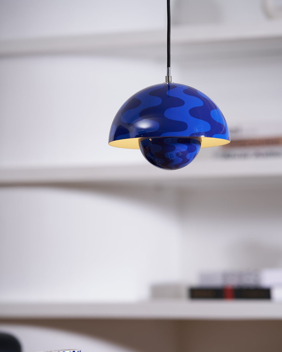 Close view of blue patterned pendant