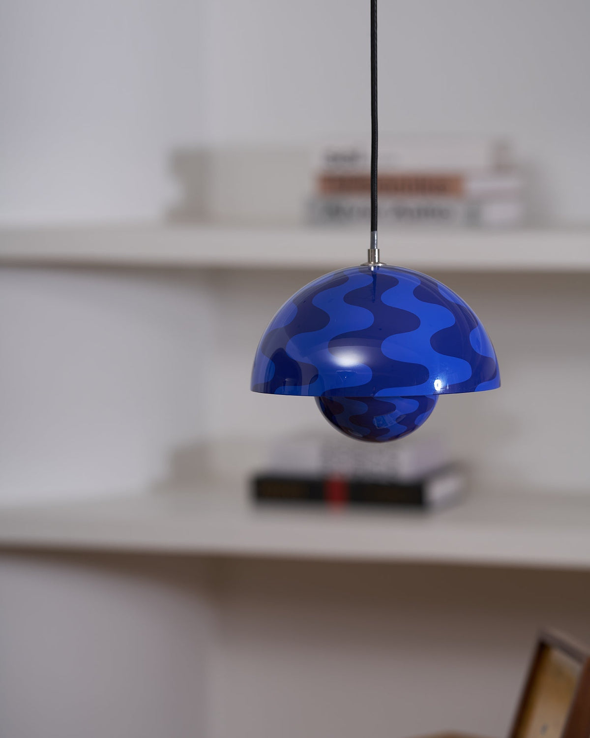 Blue patterned pendant with warm glow