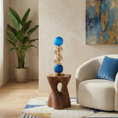 Blue glass table lamp in a living room