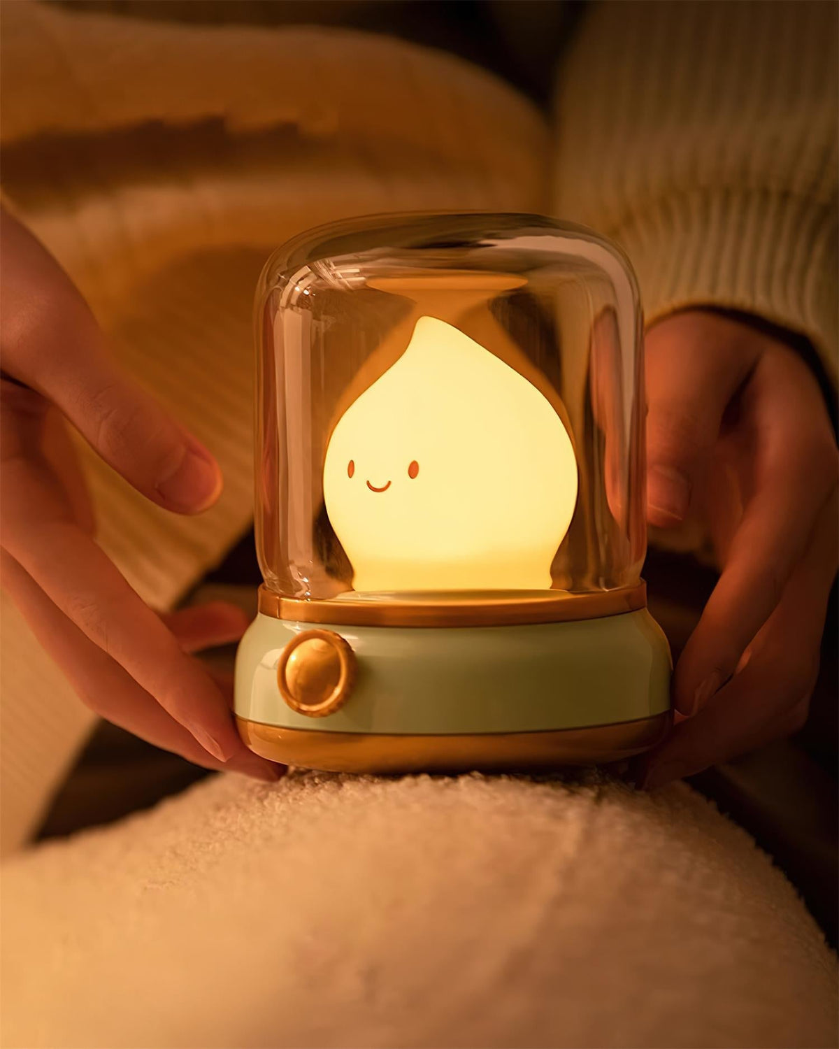 Beige lantern-style LED bedside lamp with glowing flame-shaped light 10
