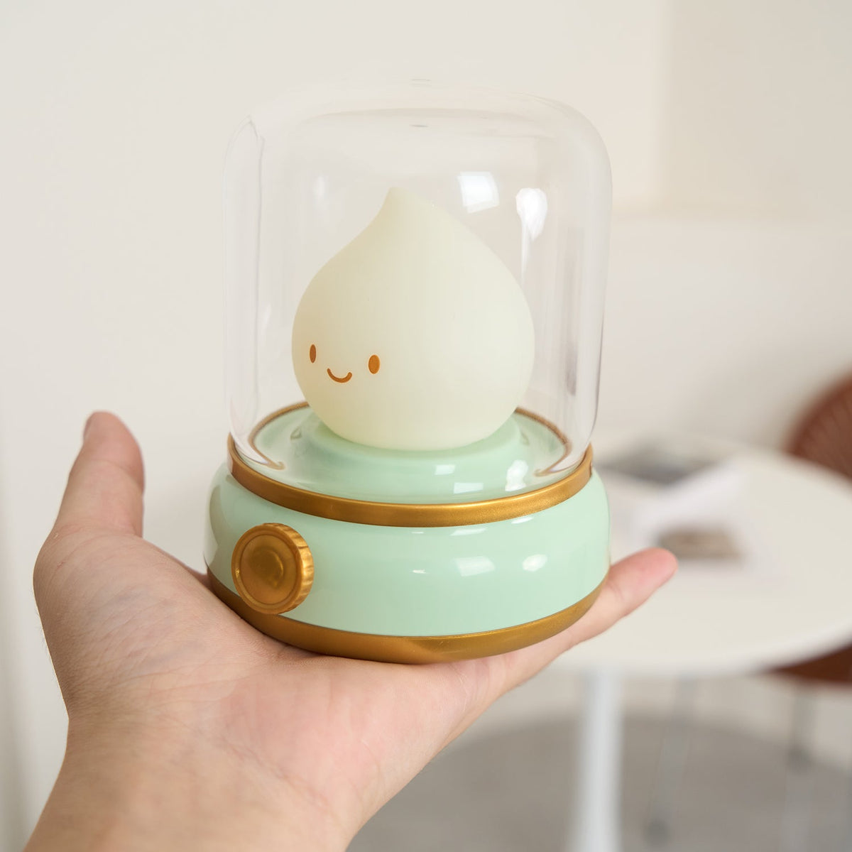 Green lantern-style LED bedside lamp with glowing flame-shaped light 24