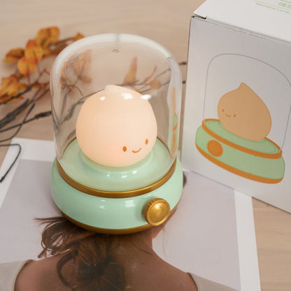 Green lantern-style LED bedside lamp with glowing flame-shaped light 26