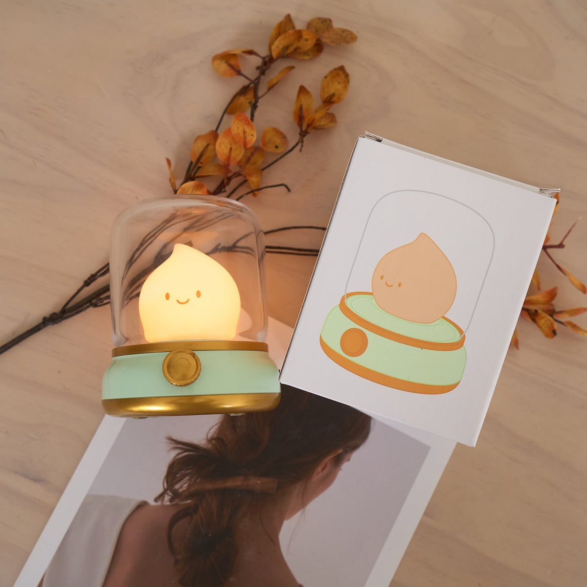 Green lantern-style LED bedside lamp with glowing flame-shaped light 27