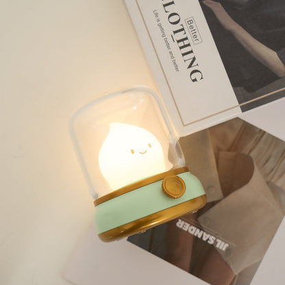 Green lantern-style LED bedside lamp with glowing flame-shaped light 30