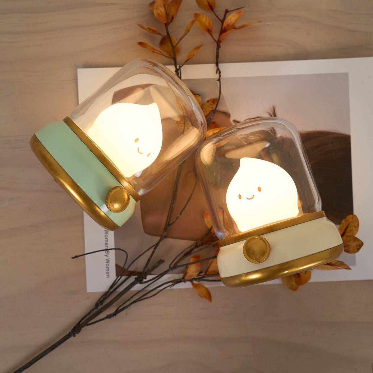 Green and beige flame-shaped LED lamps with clear lantern covers