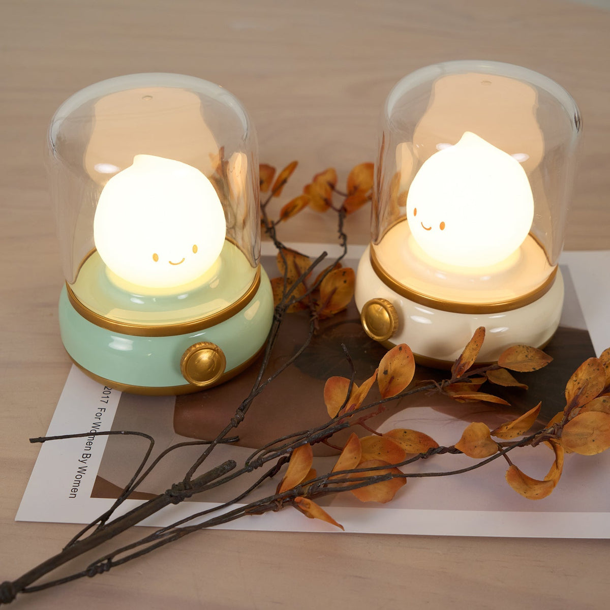Green and beige flame-shaped LED lamps with clear lantern covers