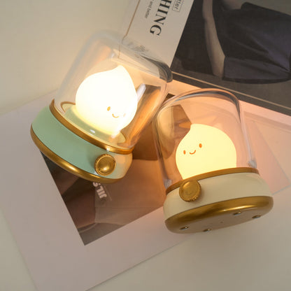 Green and beige flame-shaped LED lamps with clear lantern covers