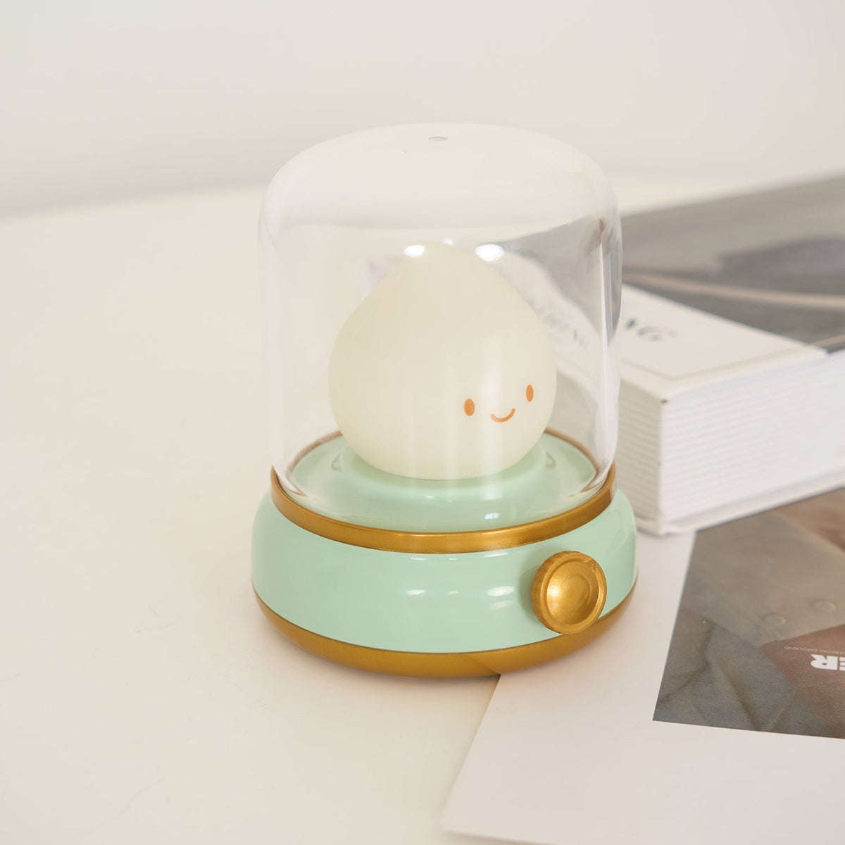 Green lantern-style LED bedside lamp with glowing flame-shaped light 41