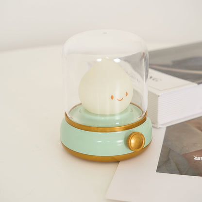 Green lantern-style LED bedside lamp with glowing flame-shaped light 41