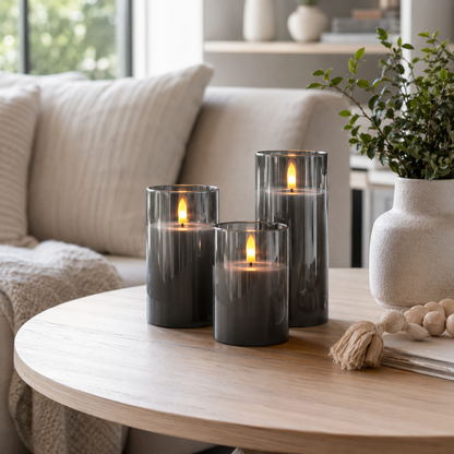 Gray flameless candles on a coffee table