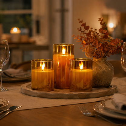 Amber candle set arranged for an evening table setting