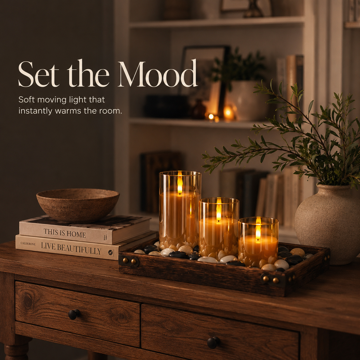 Three LED candles arranged on a wooden sideboard