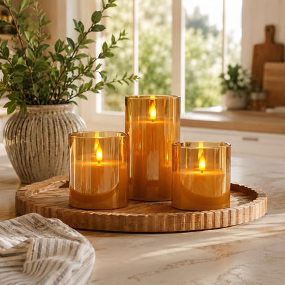 Three amber flameless candles on a tray