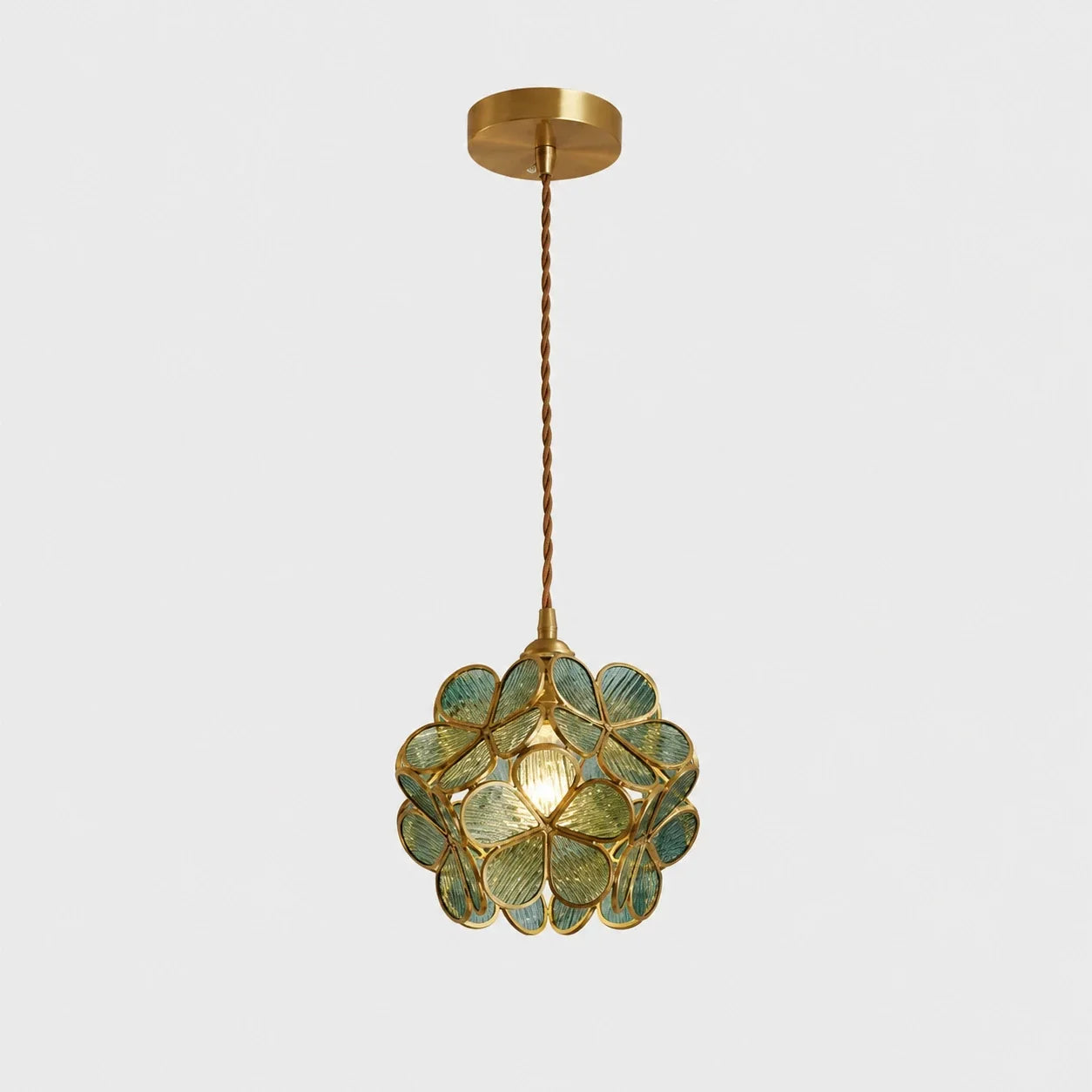 Blue floral glass petal pendant light with a metallic finish, featuring a decorative flower-shaped shade suspended by a twisted cable against a plain backg