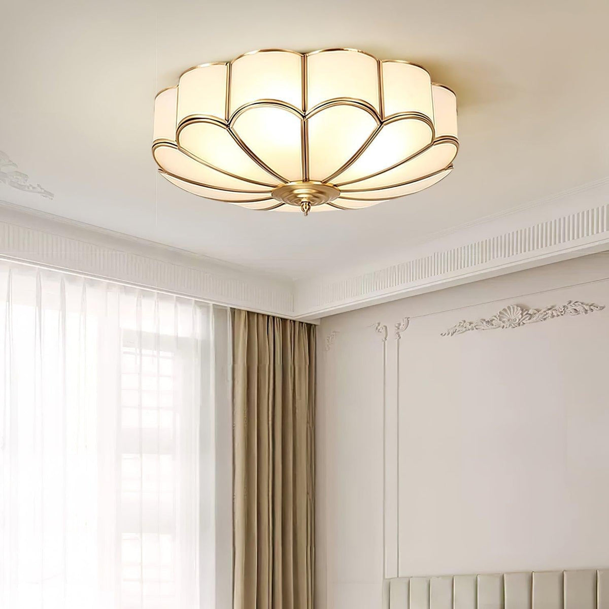 Flower-shaped glass ceiling light in a bedroom