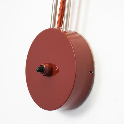 Round backplate detail on Flowerpot-style lamp