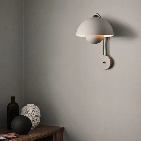 White double-dome wall lamp in a living room