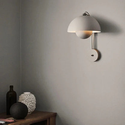 White double-dome wall lamp in a living room