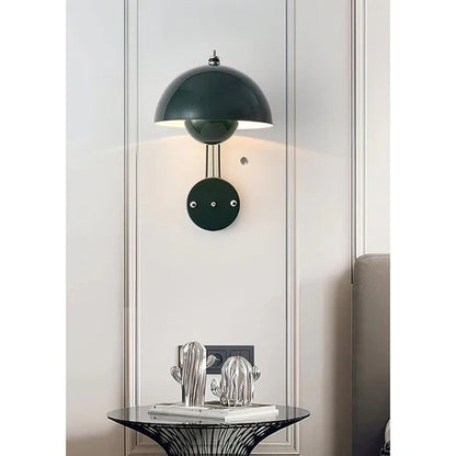 Green Flowerpot-style lamp on a wall