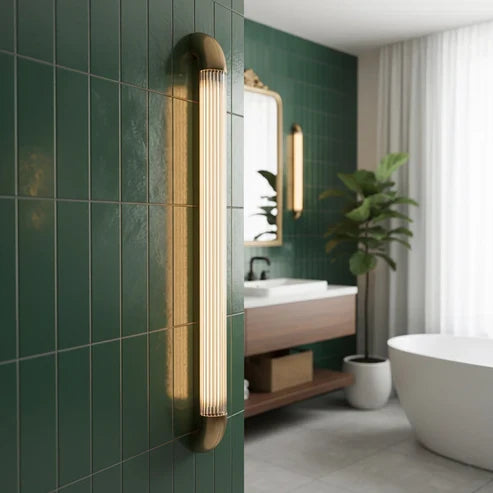 Fluted glass wall light in a bathroom