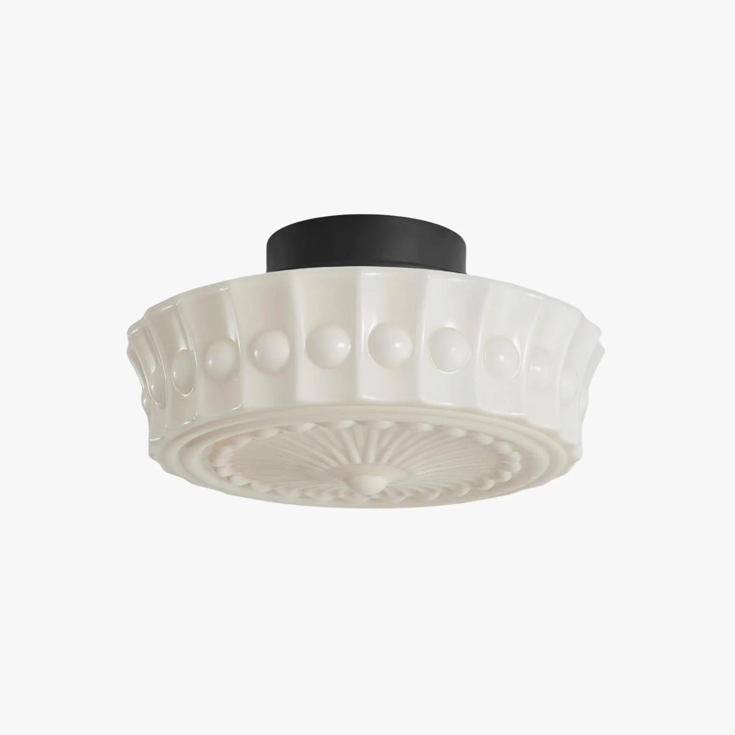 French vintage style flushmount ceiling light featuring a decorative white glass shade with embossed detailing and a sleek black mounting base.