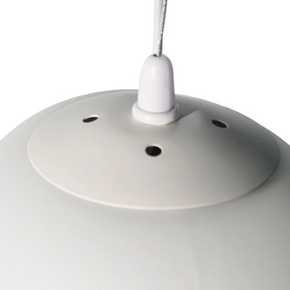 Close-up of the globe pendant ceiling canopy and cord