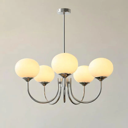 Modern 5-light pendant ceiling light featuring a polished chrome frame with five spherical cream glass ball shades, measuring 67cm in diameter.