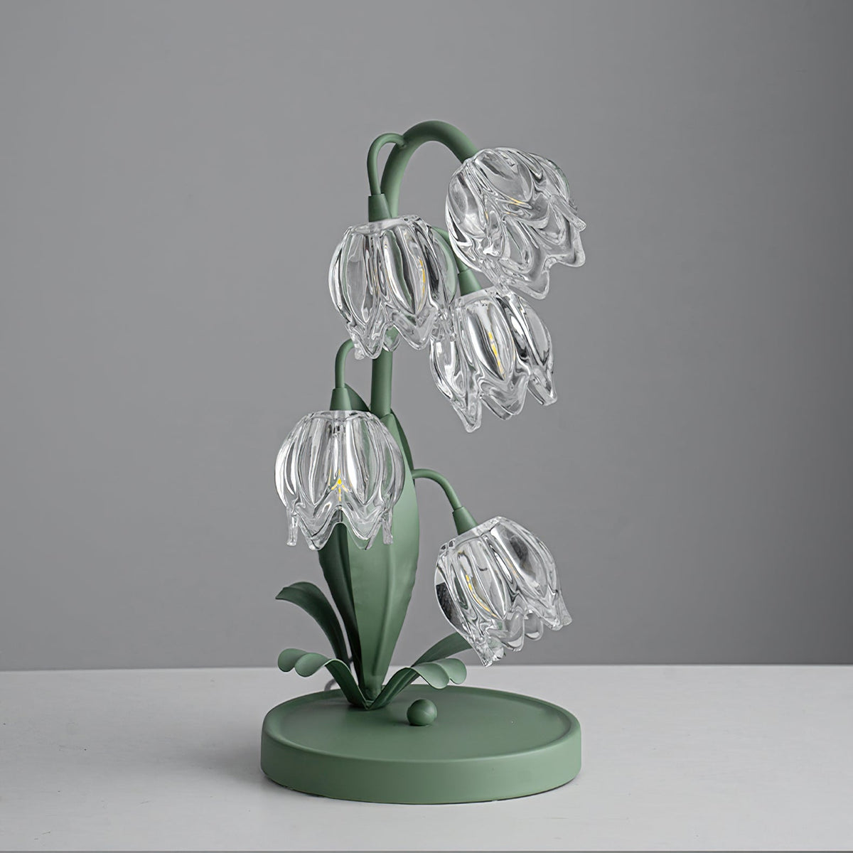 Lily-inspired glass table lamp with green metal stem 12