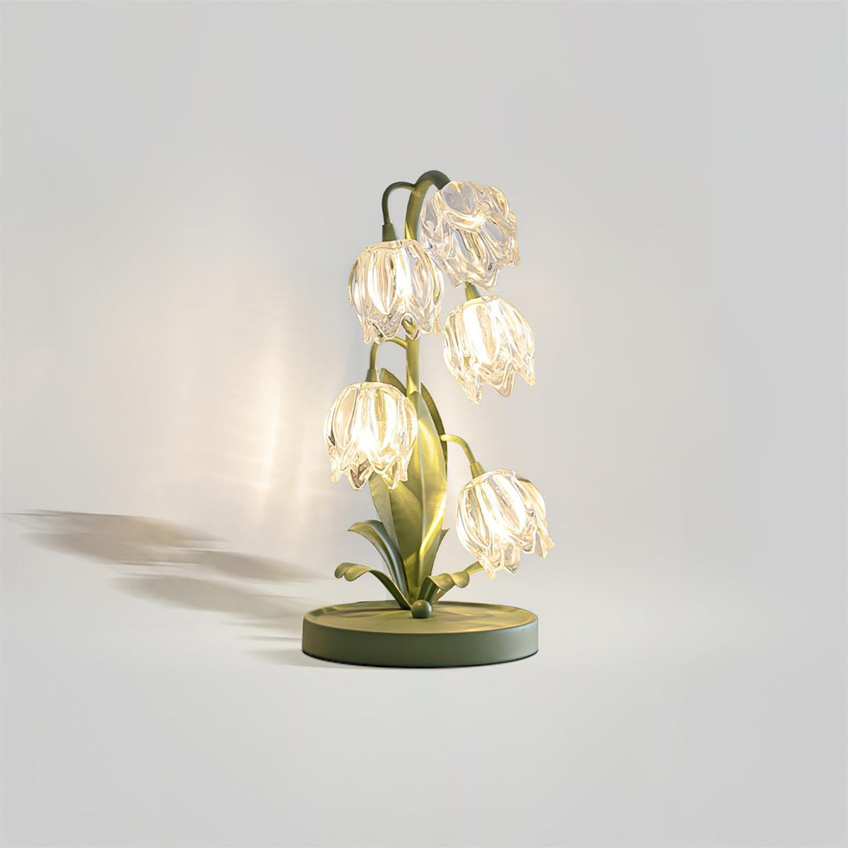 Lily-inspired glass table lamp with green metal stem 2