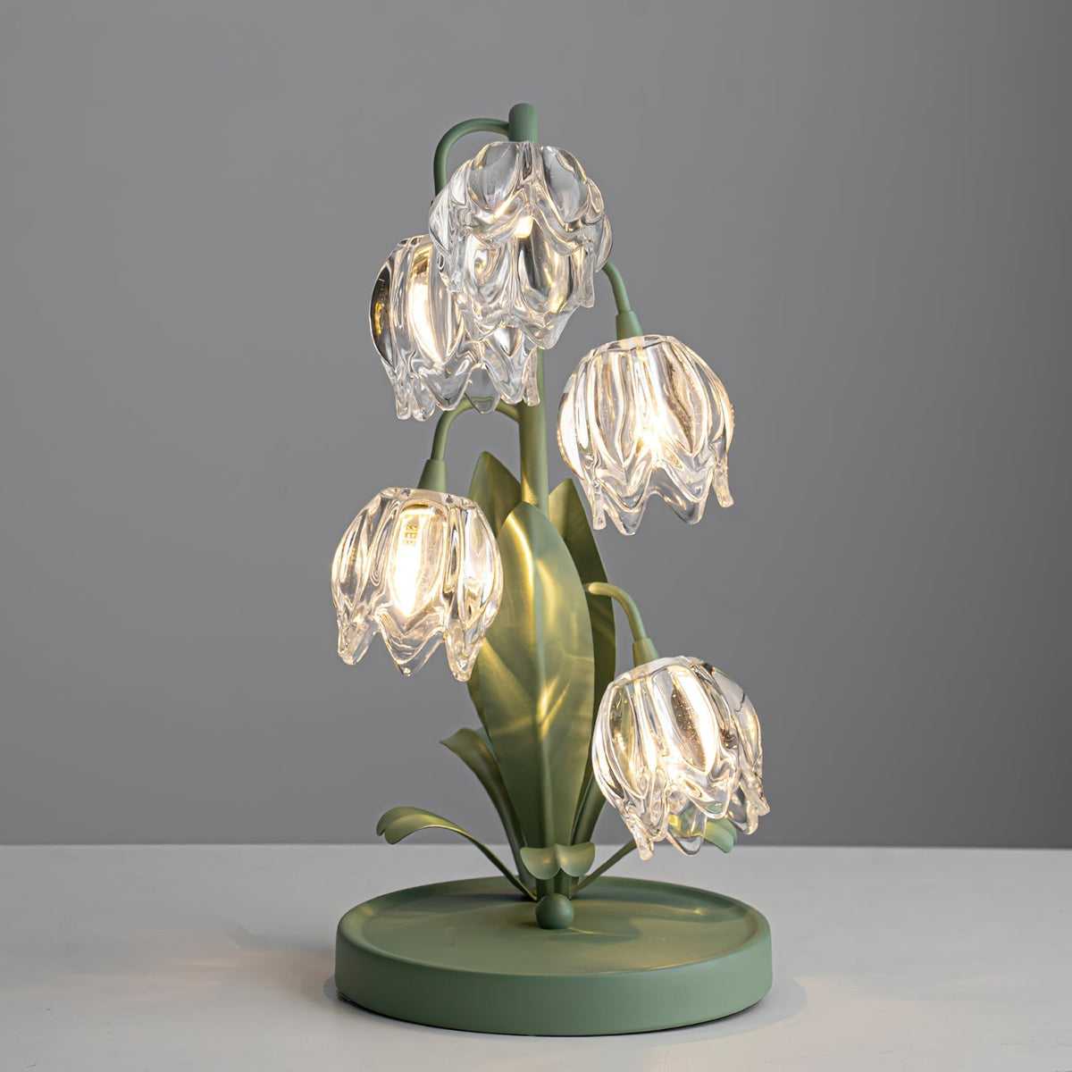 Lily-inspired glass table lamp with green metal stem 3