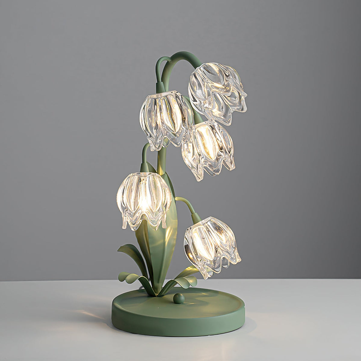Lily-inspired glass table lamp with green metal stem 7