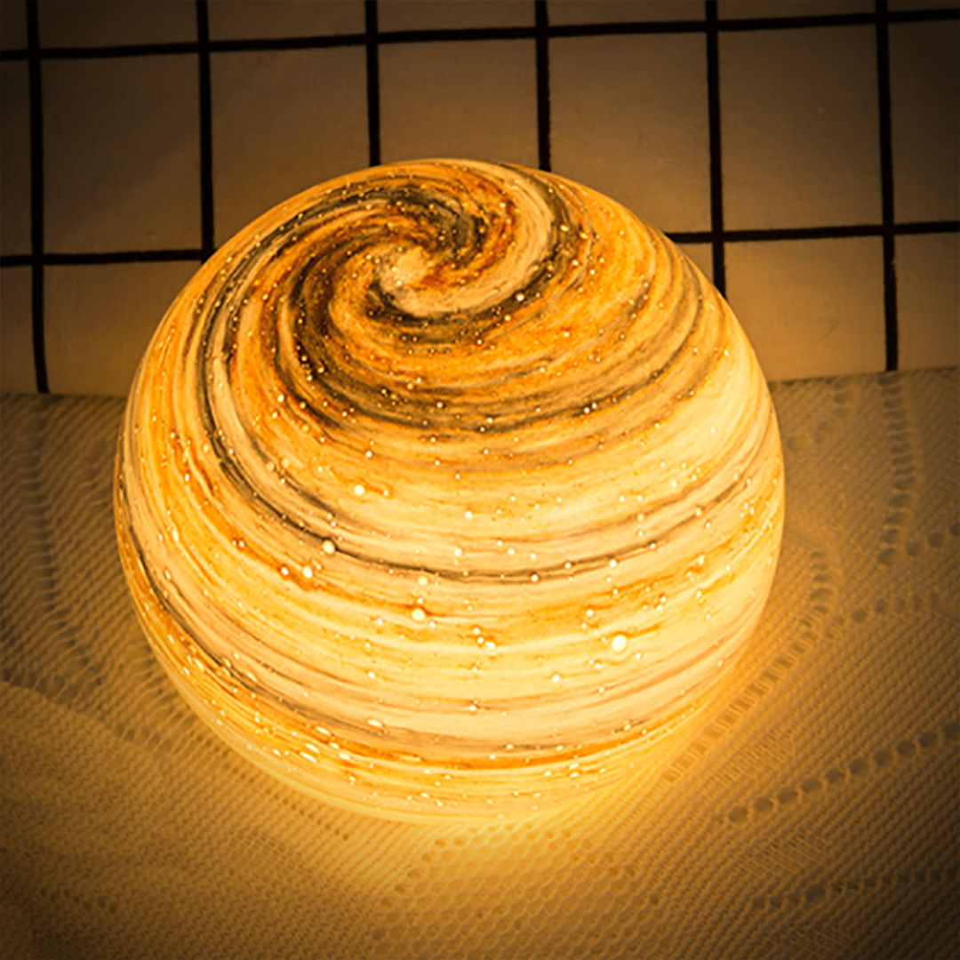 Glass moon sphere with warm amber illumination
