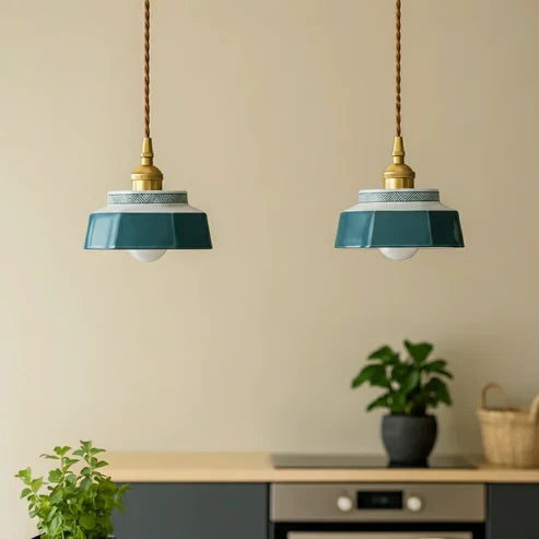 Blue Green ceramic pendants above a dining table