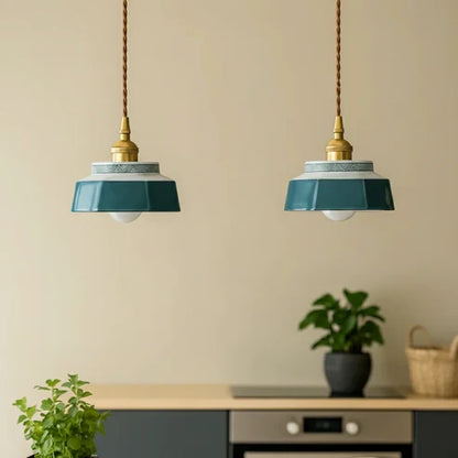 Blue Green ceramic pendants above a dining table