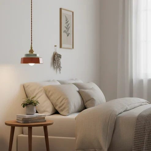 Red pendant beside a sofa