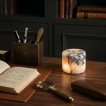 Warm glowing marble lamp on a desk