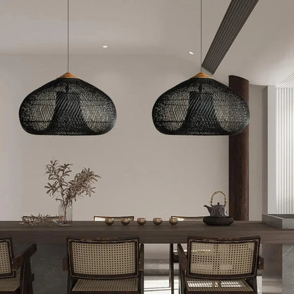 Black rattan dome pendants in a dining room
