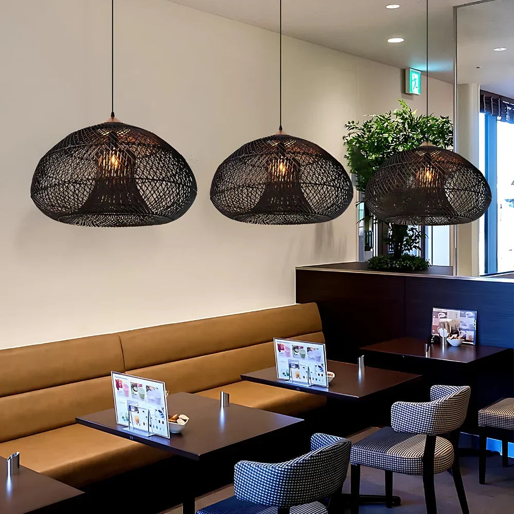 Dark woven pendant lights above restaurant seating