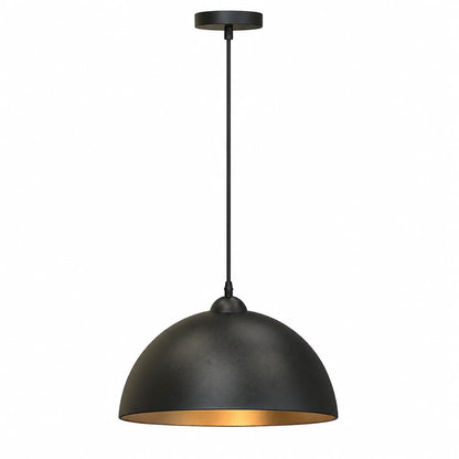 Industrial dome pendant light featuring a matte black exterior finish and a warm gold interior, suspended by a matching black cable and ceiling rose.