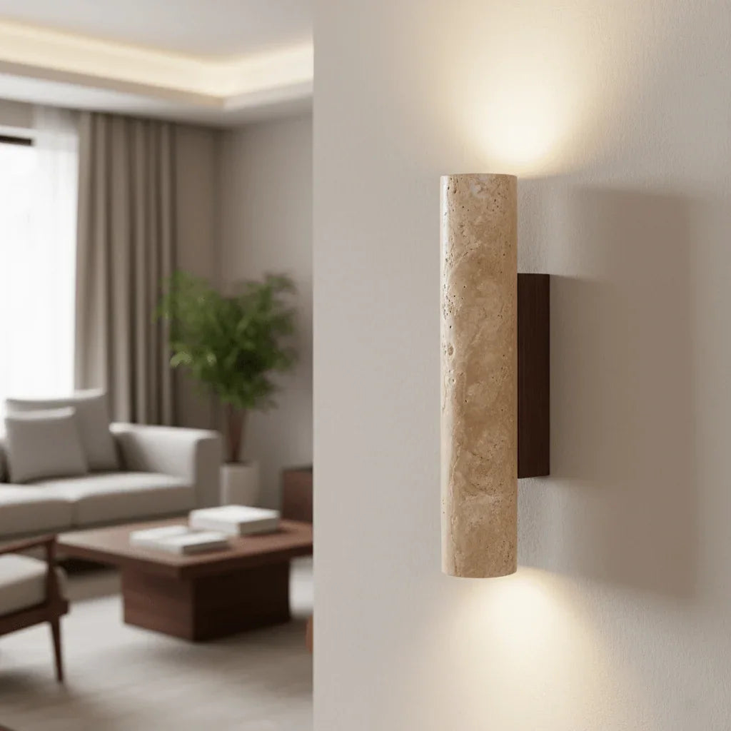 Stone cylinder wall light with wood backplate in a living room