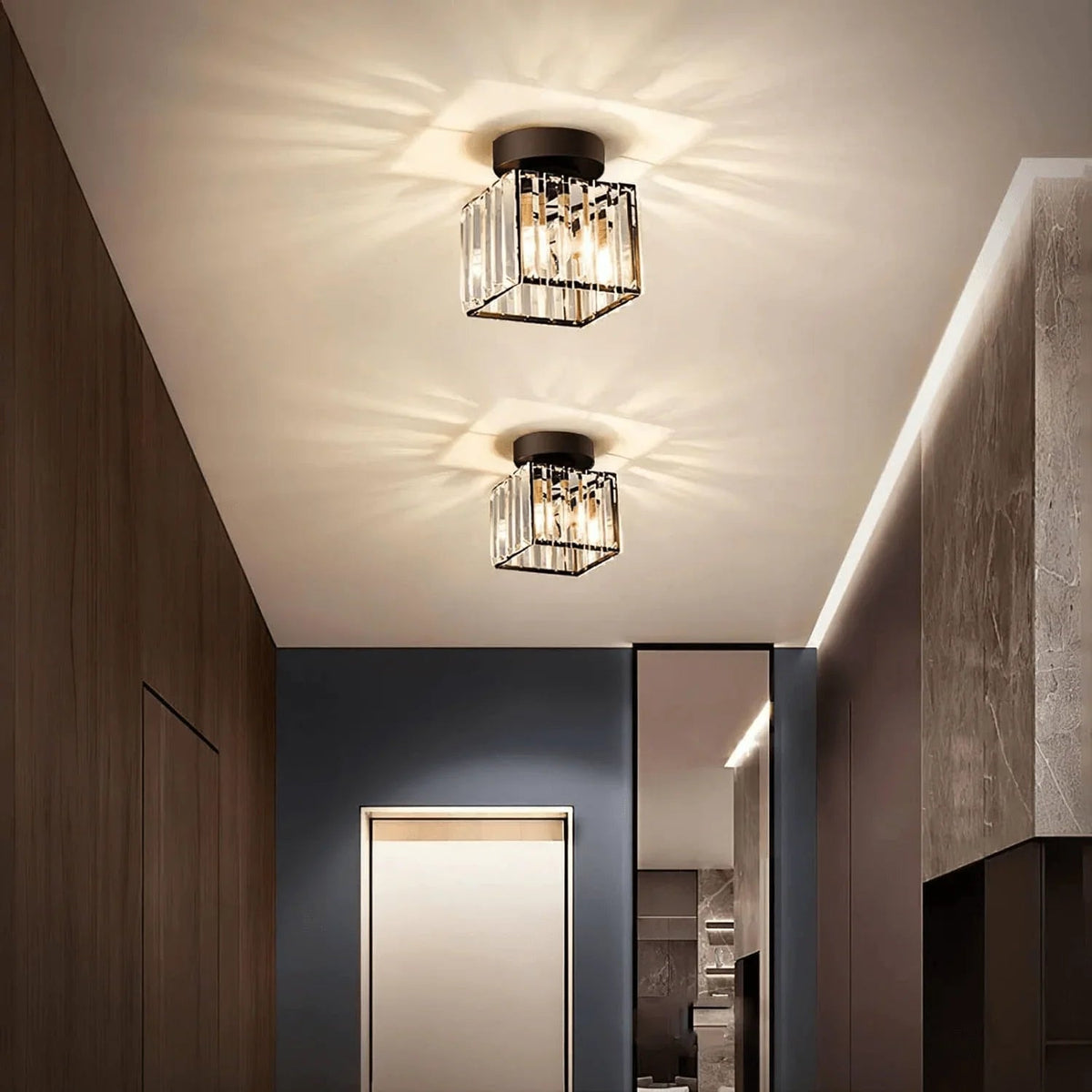 Pair of crystal ceiling lights in a corridor