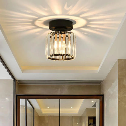 Black round crystal light with patterned ceiling glow