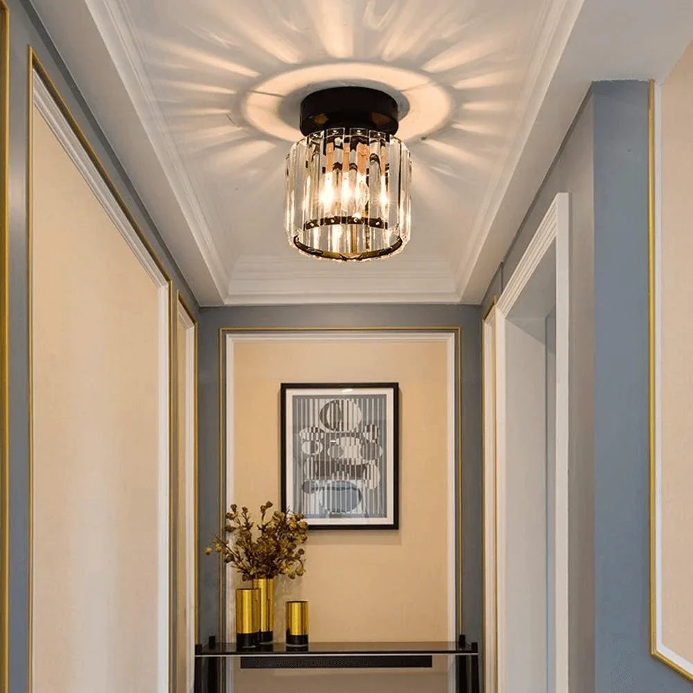 Round crystal ceiling fitting above an entrance