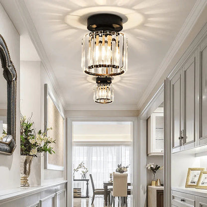 Round crystal lights along a panelled hallway