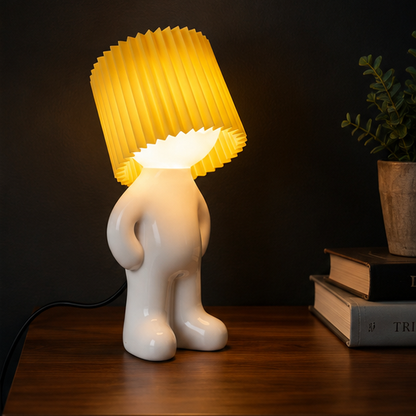 Larry character lamp with a tilted yellow shade